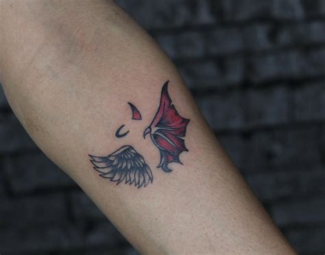 angel with devil wings|devil with wings tattoo.